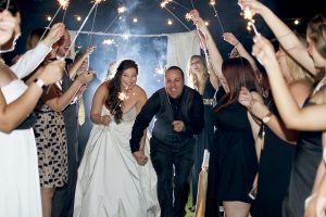 1412102124_07-04-14-wedding-sparklers-bride-and-groom
